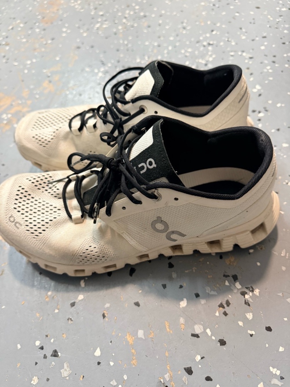 On Running Off-White and Black Runner Sneakers